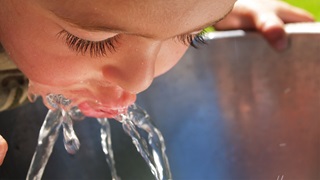 Sustainability at AVK - child drinking water