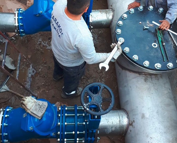 Ball check valves, dismantling joints and knife gate valves installed on wastewater collector, AVK series 53, 265 and 702