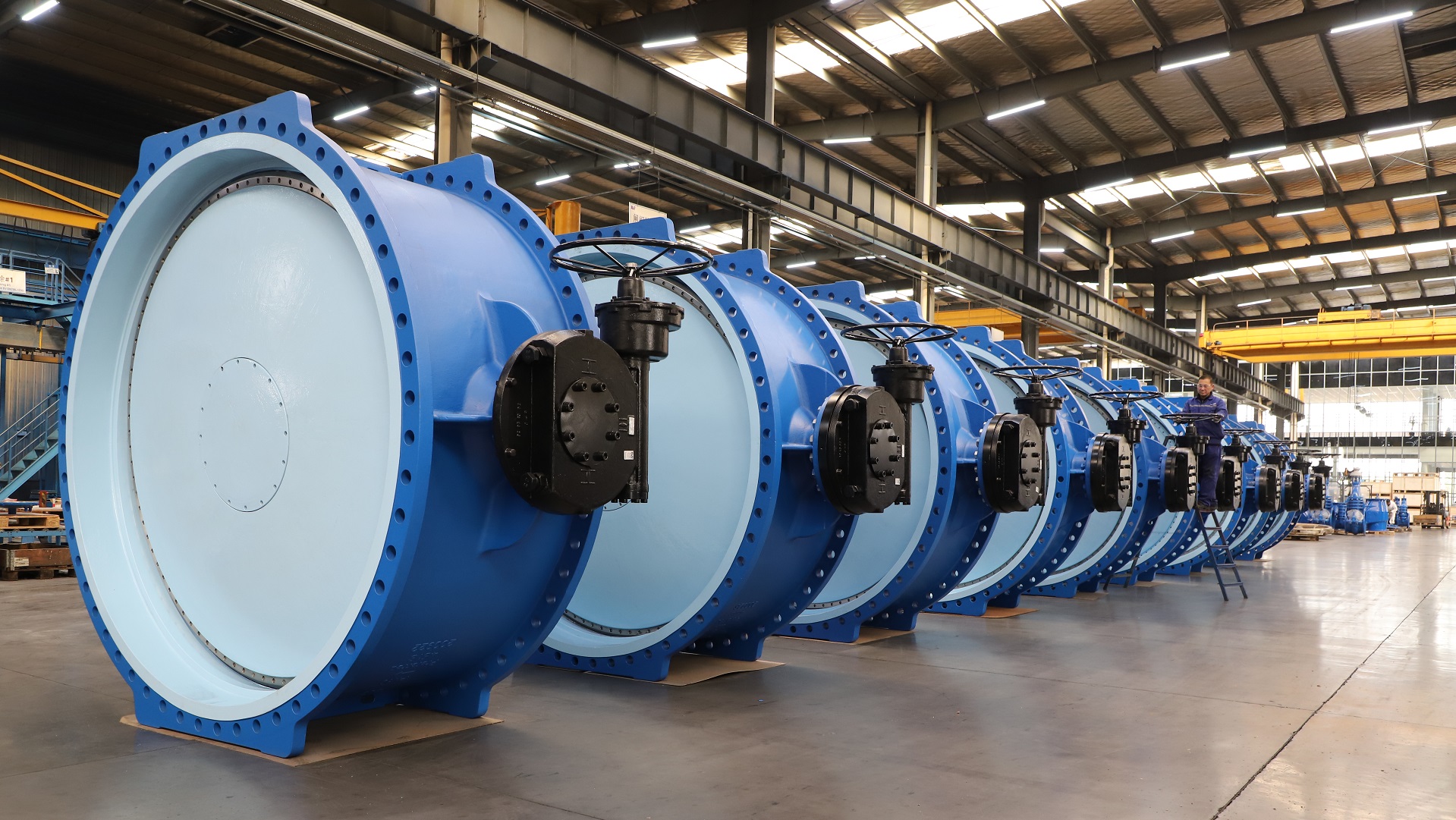 Large butterfly valves ready for installation in a warehouse