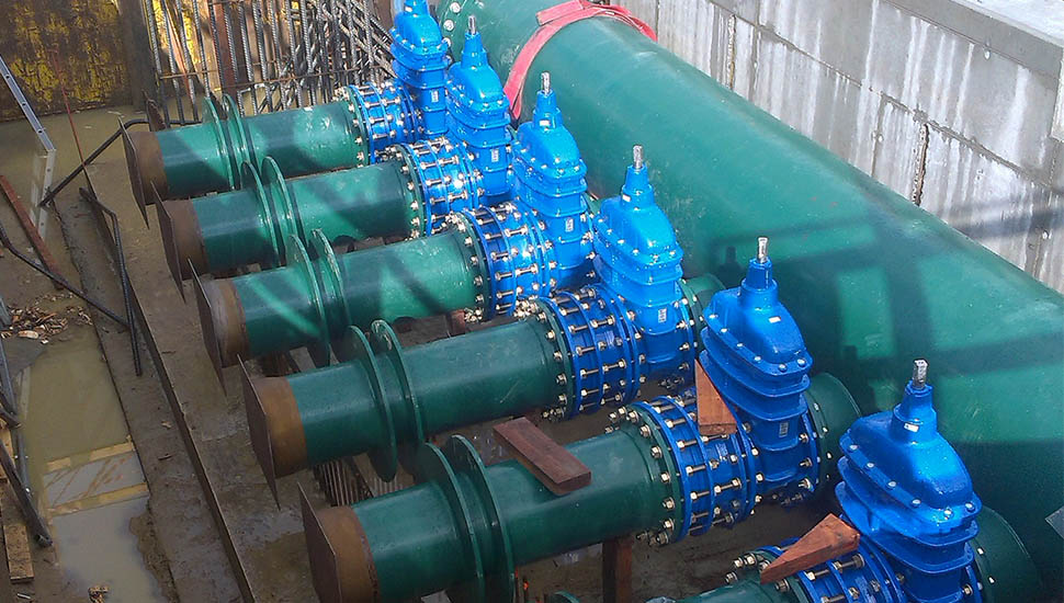 12 AVK gate valves and dismantling joints installed in main water pipe in Belgium